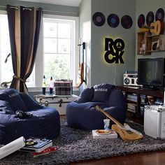 a living room filled with furniture and a flat screen tv