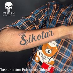 a man with a tattoo on his arm that says sitotar in the upper corner