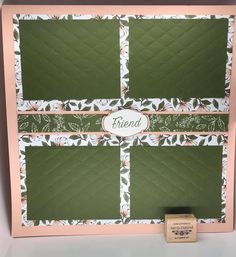 a pink frame with green and white flowers on it, next to a tag that says friend