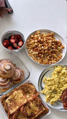 breakfast foods are laid out on the table ready to be eaten