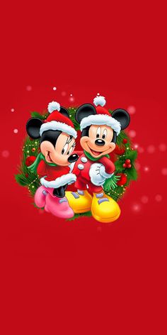 mickey and minnie mouse christmas wallpapers with santa claus hat on top, red background