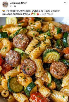 pasta with sausage, zucchini and vegetables in a white bowl on instagram