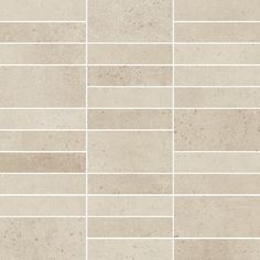 a tile wall with several different shades of beige and white tiles on the side, all lined up in rows