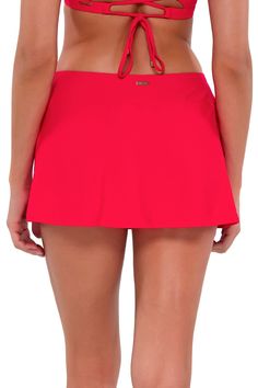 The Sporty Swim Skirt will become one of the most versatile pieces in your swimwear collection. This skirt is ideal for women who want more coverage along with functionality. Featuring hidden attached shorts and a wide waistband, it will keep you comfortable on those busy summer days. Also includes a side zipper pocket and a mid-rise fit. A Skirt for All Day: Wear this full-coverage bottom to the beach and beyond! Find Your Perfect Fit: Available in sizes XS through 16, with plus sizing in solid Solid Color Swim Dress With Built-in Shorts, Beach Season Skirted Bottoms With Built-in Shorts, Skirted Bottoms With Built-in Shorts For Beach Season, Beachwear Skirt With Built-in Shorts For Poolside, Poolside Swim Skirt With Built-in Shorts, Stretch Tennis Skirt With Built-in Shorts For Beach, Beachwear Swim Skirt With Built-in Shorts, Short Swim Skirt With Built-in Shorts For Beachwear, Fitted Swimwear With Built-in Shorts And Mini Skirt