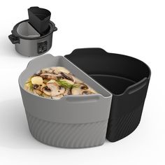 an open trash can with food in it next to a black and gray container filled with vegetables