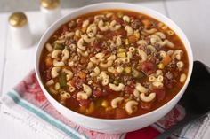 a bowl of chili macaroni and cheese soup