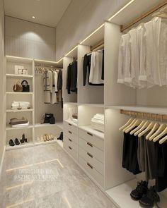 a walk in closet filled with lots of clothes