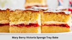 three slices of mary berry victoria sponge tray bake