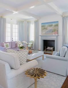 a living room filled with furniture and a fire place in front of a painting on the wall