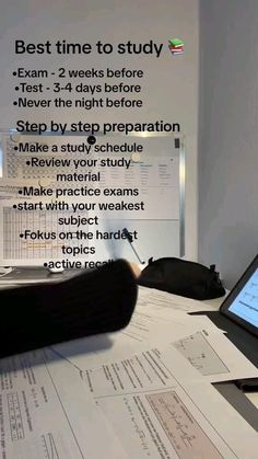 a laptop computer sitting on top of a desk covered in papers and writing paper with the words best time to study