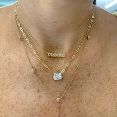 It is a timeless tribute to the extraordinary mothers who grace our lives with love, strength, and warmth. Crafted with precision and care, the Diamond Mama Necklace features a delicate pendant that elegantly spells out "MAMA" in a script font, adorned with brilliant diamonds. This sterling silver necklace is not just a piece of jewelry; it's a symbol of the unconditional love and selfless dedication that define motherhood. Diamond Necklace With Si Clarity For Anniversary, Engraved Diamond Jewelry For Mother's Day, Mother's Day Engraved Diamond Jewelry, 14k Gold Jewelry With Diamond Accents For Mother's Day, Cubic Zirconia Name Necklace For Gift, Mother's Day 14k Gold Jewelry With Diamond Accents, Diamond Accents Name Necklace For Gift, Sterling Silver Name Necklace With Diamond Accents, Si Clarity Diamond Necklace For Anniversary