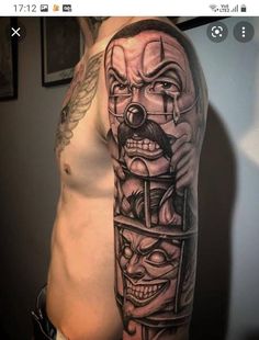 a man's half - sleeved tattoo with an image of two clowns