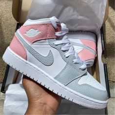 These Gray Pink Custom Air Jordan 1 shoes offer an original and stylish look. Crafted with a gray and pink exterior, they feature a custom midsole and iconic design. They are sure to make a statement wherever you go. The perfect gift for friends, family, that special someone, or yourself ✨ - Exactly as shown in the pictures. - Brand New & Authentic. 💯 - Hand Painted with attention to detail. 👨‍🎨 - Waterproof and Flexible. ❤️ - Unisex model. Please refer to the Size Chart. - Free Worldwide Shi Air Jordan 1 Grey, Air Jordan 1 Custom, Jordan 1 Grey, Jordan 1 Pink, Jordan 1 Custom, Cute Jordans, Custom Air Jordan 1, Custom Air Jordan, Nike Jordans