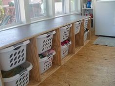 the laundry room is clean and ready to be used as a place for storing clothes