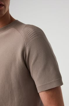 Strategic seaming at the elbows and shoulders enhance your freedom of movement in this Italian-made sweater built from a ribbed performance knit. 24" length (size Medium) Crewneck Short sleeves Antimicrobial fabric engineered to inhibit the growth of odor-causing germs 60% recycled polyamide, 40% polyamide Dry clean or machine wash, dry flat Made in Italy Fine Rib Knit, Minimal Fashion Men, Unisex Knitwear, Mens Casual Outfits Summer, Sport Sweater, Knit Men, Summer Knitting, Knitwear Men, Men's Knit