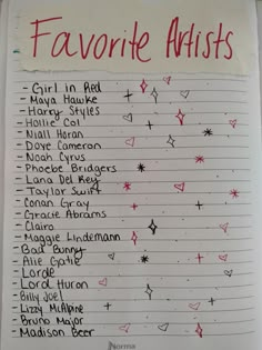 a list of favorite artists written on a piece of white paper with red writing in it