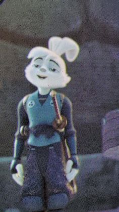 a cartoon character is standing in front of a tv screen