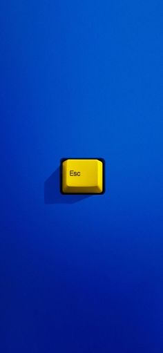 an electronic device is shown against a bright blue background with the word emc written on it