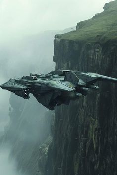 a fighter jet flying over a cliff in the sky