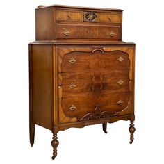 an old fashioned wooden dresser with drawers