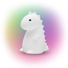 a small white toy sitting in front of a rainbow colored background with the shape of a dinosaur