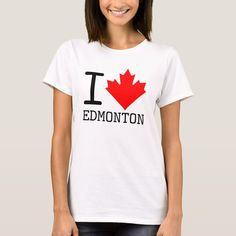 a woman wearing a t - shirt that says i love edmonton