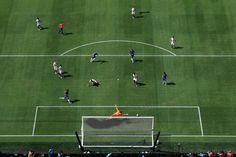 soccer players are on the field during a game