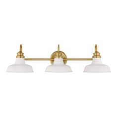 three light bathroom fixture in an antique brass finish with white glass shades on the sides