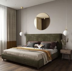 a bedroom with a large bed and round mirror on the wall