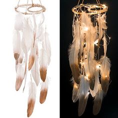 a white dream catcher with fairy lights hanging from it's sides and an image of a light up dream catcher