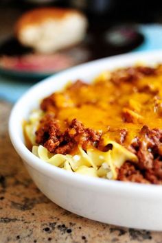 a close up of a bowl of food on a table