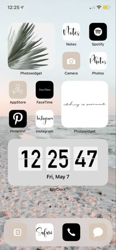 an iphone screen with the date and time displayed on it, along with other icons