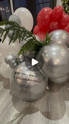 balloons and greenery are on display at an event