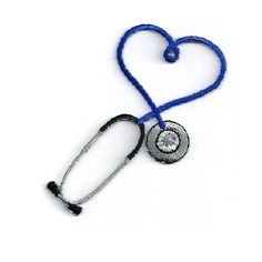 a heart shaped stethoscope with a blue lanyard attached to the end