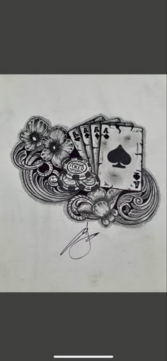 some playing cards and scissors on a white table top with the words,'i love you