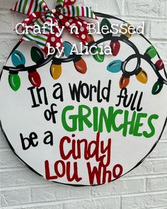 a sign that says, i'm a world full of grinies be a candy lou