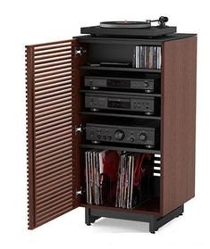 an entertainment center with many different types of audio equipment