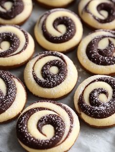 chocolate swirl cookies on a baking sheet ready to be baked in the oven for christmas