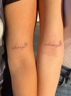 two people with matching tattoos on their arms that say always and always in cursive writing