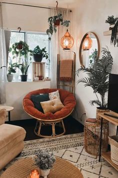 a living room filled with furniture and plants