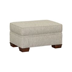 the foot stool is upholstered and ready to be used as a storage bench