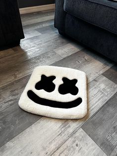 a black and white cat rug on the floor