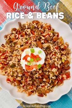 ground beef rice and beans in a white bowl on a colorful table cloth with text overlay