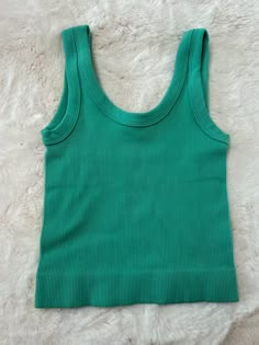 This tank top features a durable blend of nylon and spandex with a thick ribbed design available in one size. Pair it with jeans, skirts, shorts, pants. Obx Outfits, Summer Tank Top Outfits, Beachy Outfit, Preppy Tops, Preppy Things, Summer Wallpapers, Preppy Clothes, Summer Ootd, Tank Top Outfits