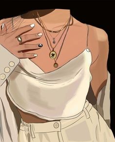 a woman with her hand on her shoulder wearing a white shirt and gold necklaces