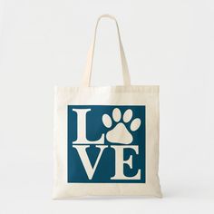 a tote bag with a dog's paw and the word love on it