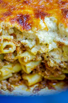 a casserole dish with meat and cheese on it