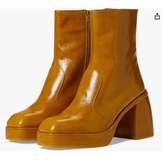 New Free People Women's Ruby Shine Platform Ankle Bootie Sedona Sz 40 Mustard Yellow Size 40/ Us 9-9.5- Sedona (Mustard Yellow/Burnt Orange Color) - Block Heel - Side Zip Closure - Square Toe - Rubber Sole New With Box, But Doesn't Have The Box Top. Was In The Retail Store And Has Been Handled/Tried On, But Not Worn. Mustard Color Boots, Yellow Round Toe Heels For Fall, Retro Ankle-high Heels, Bold Ankle-high Boots With Reinforced Heel, Spring Leather Platform Boots With Almond Toe, Spring Platform Boots With Reinforced Almond Toe, Leather Platform Boots With Almond Toe For Spring, Yellow Leather Ankle-high Boots, Yellow Round Toe Heeled Boots For Fall