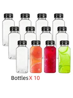 six bottles with different colored liquids in them