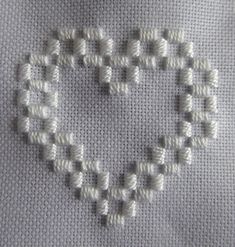 the heart is made out of white thread